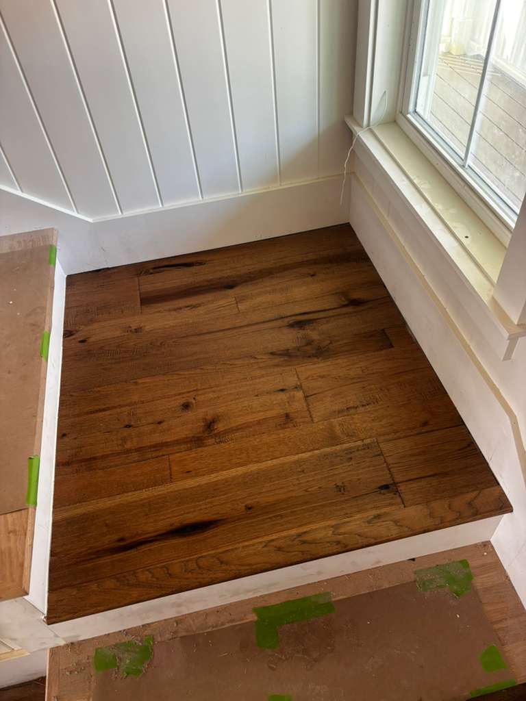 Wood flooring detail near a window